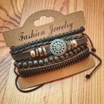 CONJUNTO DE PULSERAS DE CUERO CON DIJE DE SOL CELTA MARRON